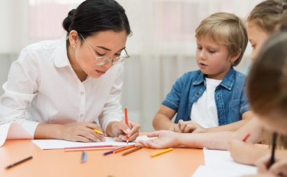 young-teacher-doing-her-class-with-kids young-teacher-doing-her-class-with-kids